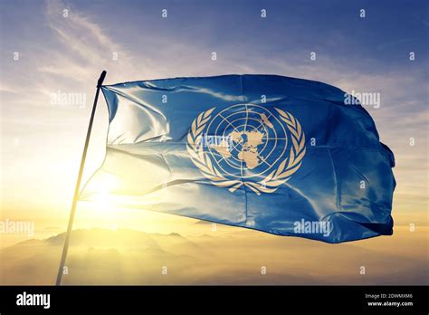 United Nations Un Flag Waving On The Top Stock Photo Alamy