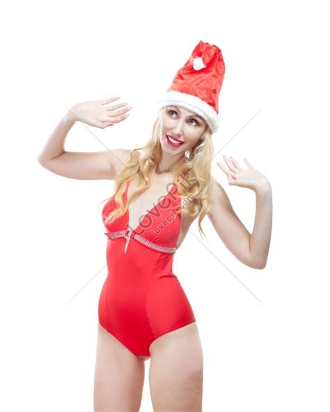 รูปสุภาพสตรีที่งดงามในชุดว่ายน้ำสีแดงและหมวกซานตาคลอสสีแดง Hd ภาพถ่ายหญิง ฤดู หญิงสาว ดาวน์