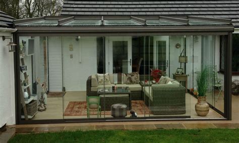 A Beautiful Glass Room Creating A Peaceful Location To Sit Back And Enjoy The Garden With