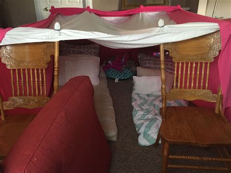 A Fort Made Out Of Blankets And Sheets Sleepover Party Games Fun
