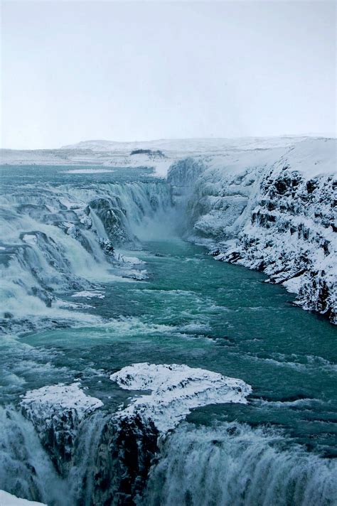 The Raging Gullfoss Waterfall In Iceland Atlas And Boots