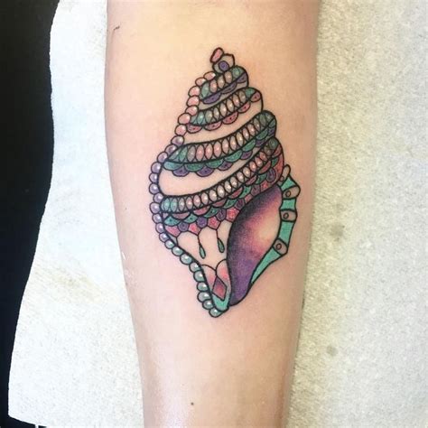 There are 121 seashell tattoo for sale on etsy, and they cost $8.51 on average. Conch Seashell Tattoo | Tattoo Ideas and Inspiration | Seashell tattoos, Shell tattoos, Conch ...