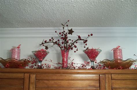 Christmas in the kitchen with mini wreaths on cabinet doors. Red Vignette and Valentine Garland | Top of cabinet decor, Valentine garland, Decor