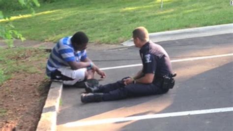 Charlotte Photo Of Police Officer Consoling Teen Goes Viral
