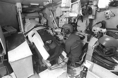 A Gunner Inside The Xm 1 Abrams Tank Checks The Fire Control System