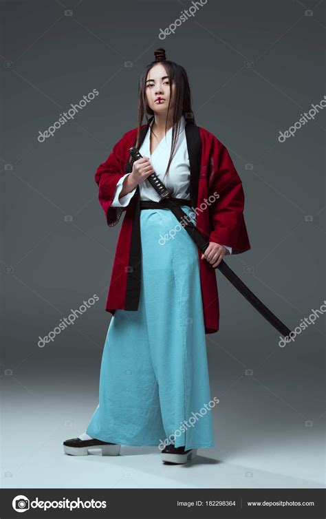 Samurai Kimono Holding Katana Sword Looking Camera Grey — Stock Photo