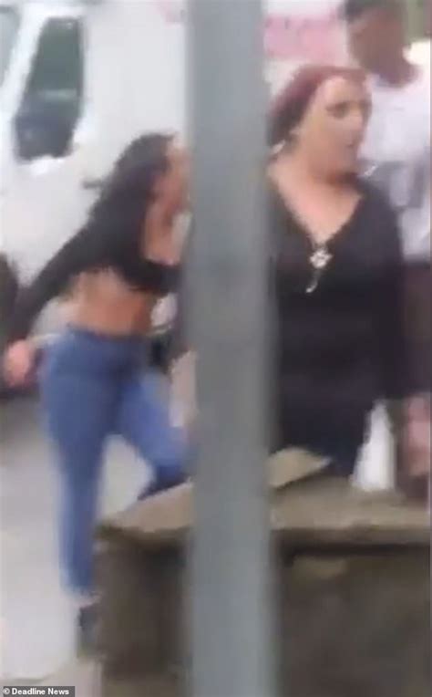 Womans Top Is Almost Ripped Off In Vicious Brawl With Another Woman On