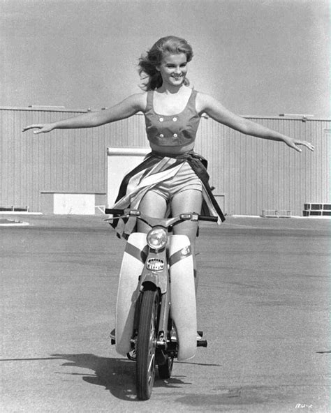 Full Shot Of Ann Margret As Rusty Martin Standing On Moving Motor Bike