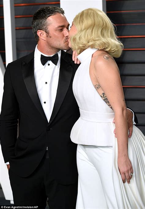 Lady Gaga Shares A Kiss With Taylor Kinney On Arrival To Vanity Fair