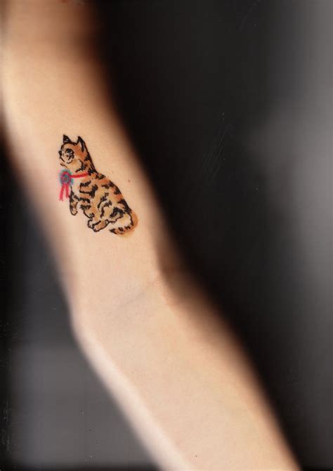 It's a tiny hardship amongst something far scarier, but for generations large numbers of cancer patients have received miniature tattoos during. modern body tattoo: Prostate Cancer Ribbon Tattoo