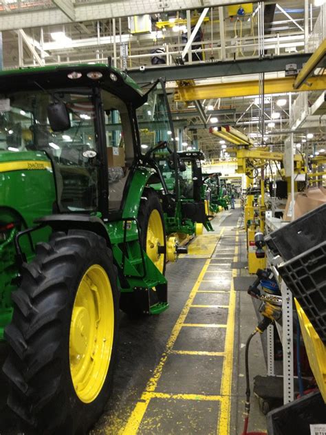 New Tractors Rolling Off The Assembly Line At The John Deere Tractor