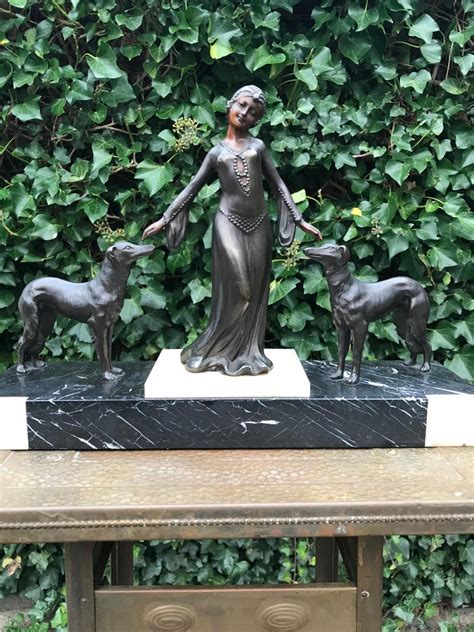 Stylish Art Deco Lady In Dress With Her Greyhounds Sculpture On A