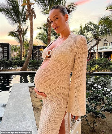 Pregnant Peta Murgatroyd Showcases Her Growing Bump In A Busty Beach Dress As She Enjoys A