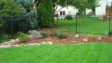 The designated garden area is kept visually separate. Create Your Beautiful Gardens with Small Backyard ...