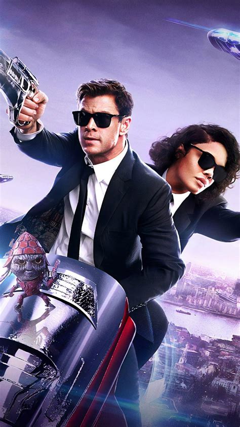 The men in black have always protected the earth from the scum of the universe. Chris Hemsworth & Tessa Thompson In Men In Black ...
