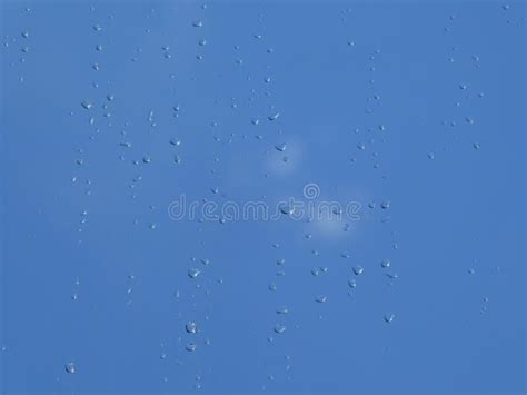Rain Drops On The Window With Cloud And Sky After The Rain Stock Photo