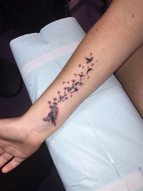 cute girly tattoo of a dandelion blowing into birds tatuagem tatuagens jovens tatuados