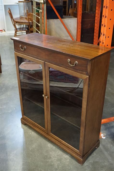 5 out of 5 stars. WALNUT GLASS DOOR DISPLAY CABINET - Big Valley Auction