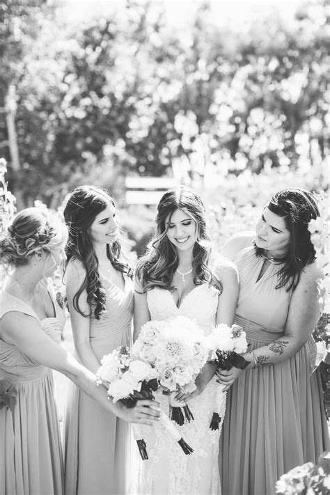 Black And White Photo Of Bride And Bridesmaids At Winery Wedding In