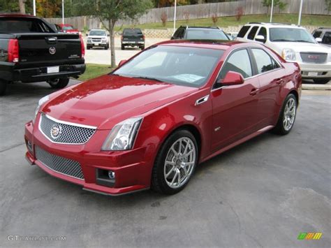 Models without navigation feature a view screen built into the rear view mirror. 2011 Crystal Red Tintcoat Cadillac CTS -V Sedan #39943729 ...