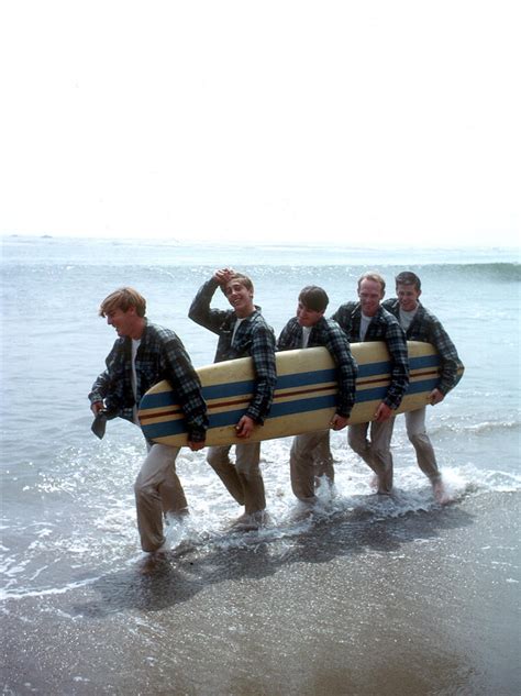Beach Boys On The Beach With A Surfboard By Michael Ochs Archives