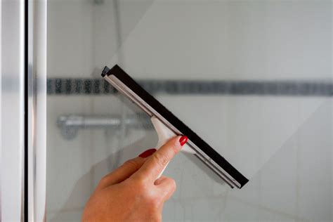 How To Clean Your Shower Doors Using Only Vinegar Style Squeeze