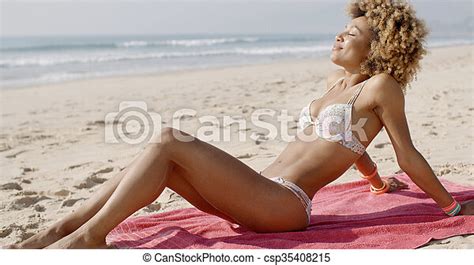 Beautiful Woman Sunbathing On A Beach African American Beautiful Woman