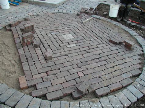 The size of the patio is an obvious factor, as larger patios require more bricks. Salvaged Granite Cobble & Clay Paver Patio | the irregular ...