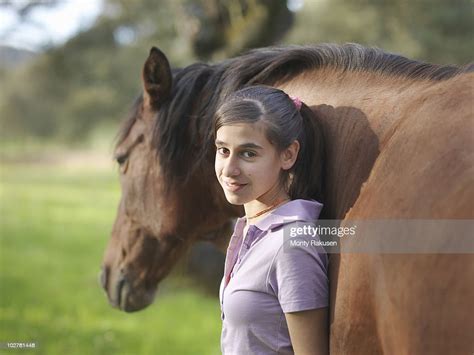 Girl Posing With Her Horse Photo Getty Images
