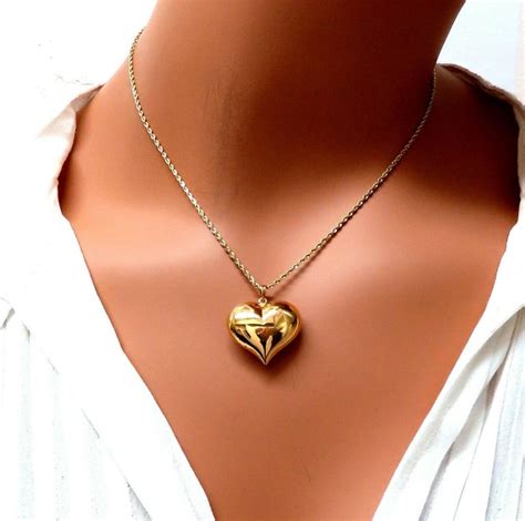 Use the gold gram calculator to see how much your items are worth per gram of gold, or to figure what you might be willing to pay based on the cost of gold per gram. Prime Classic 14 Karat Gold Heart Necklace Charm Puff ...