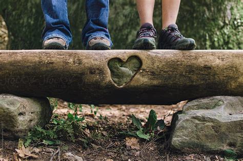 Feet In Hiking Boots On Forest Bench With Heart Pordeirdre Malfatto
