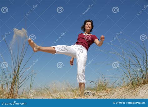 Girl Kicking Sand Stock Image Image Of Aerobic Grass 2494035