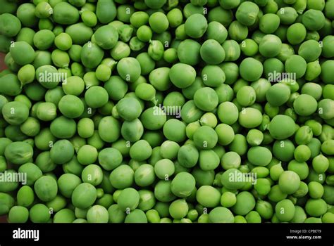 Shelled Fresh Ripe Sweet Green Peas Background Stock Photo Alamy