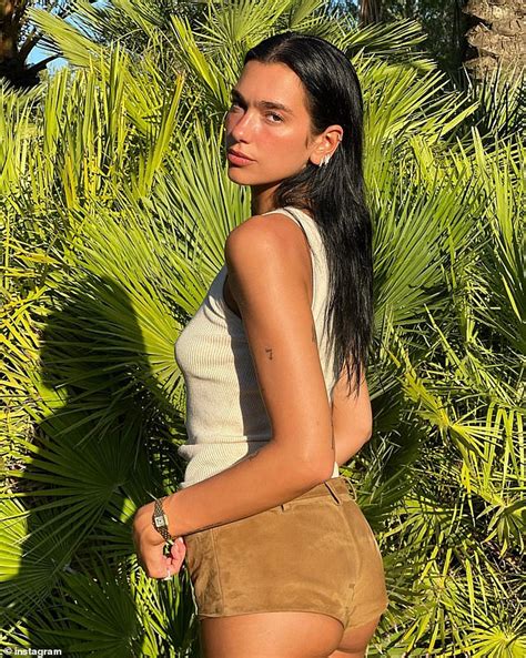 Dua Lipa Puts On Very Cheeky Display In Skimpy Shorts As She Shows Off