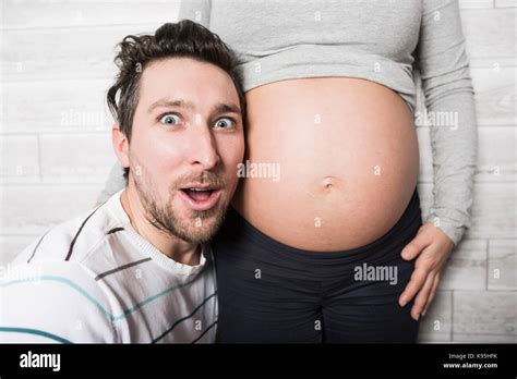 Pregnant Mother And Her Husband On Baby Room Stock Photo Alamy