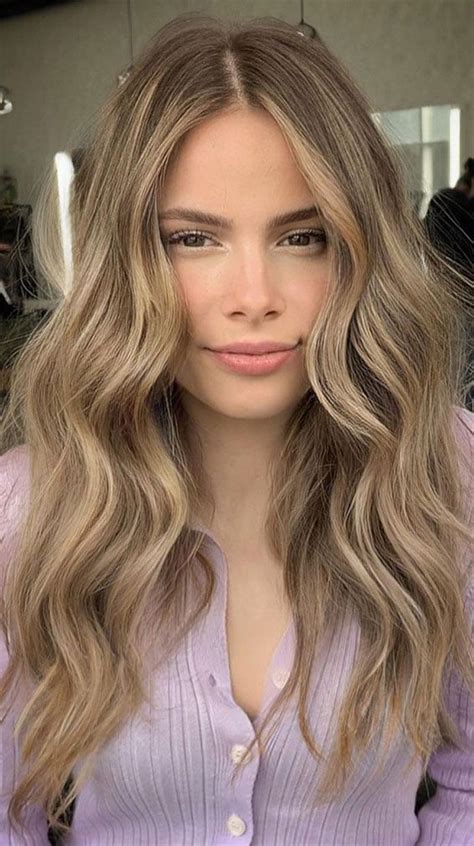 Best Hair Colours To Look Younger Blonde With Highlights In 2021 Soft Blonde Hair Warm