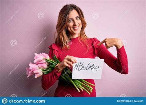Beautiful Brunette Woman Holding Best Mom Message And Tulips Celebrating Mothers Day With