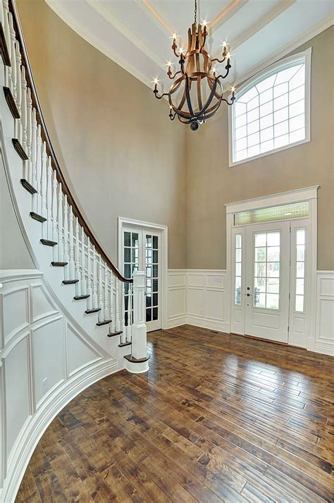 Chandeliers chandelier lighting 2 story foyer chandelier lighting height chandeliers for. curved staircase farmhouse - Google Search | Foyer ...