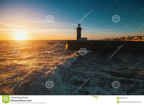Beautiful Sunset On The Ocean Lighthouse At Coast Of Portugal Porto