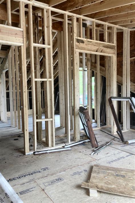The Interior Of A House Being Built With Wood Framing