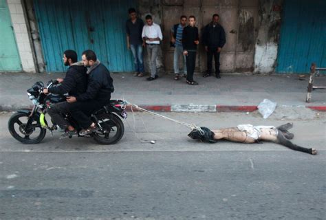 Video Men Drag Body Of ‘israeli Spy Through Gaza Streets The