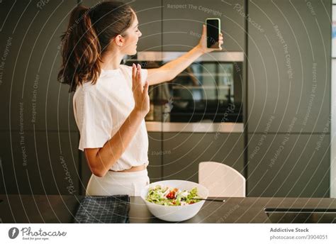 Woman Taking Selfie In Kitchen A Royalty Free Stock Photo From Photocase
