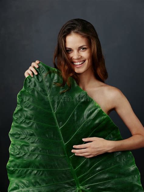 Cheerful Woman Covers Herself With A Green Leaf Naked Body Smile Stock
