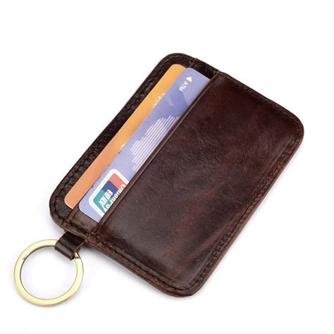 Here are 10 lean card cases to lighten the load in your back pocket. Key Ring Genuine Leather Thin Card Case Mens Front Pocket Card Holder Purse Slim Wallet Men Mini ...