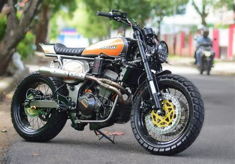 The force comes from a 310 mm disc brake up front while the. Kawasaki Ninja 250R Street Tracker - BikeBound