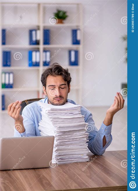Young Male Employee And Too Much Work In The Office Stock Image Image
