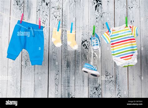 Baby Clothes Hanging On The Clothesline Stock Photo Alamy