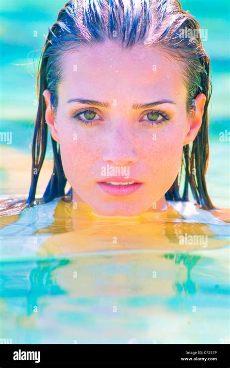 Female Wet Blonde Hair In Swimming Pool Head Just Above Water Stock