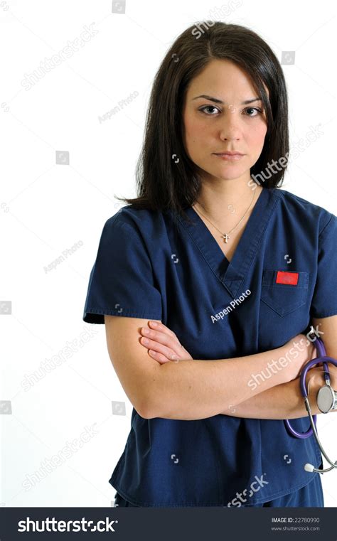 Serious Nurse Dark Blue Scrubs Standing With Arms Folded Holding Stethoscope Close Crop Stock
