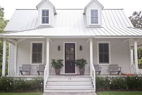White And Black Metal Roof Houses Farmhouse Exterior House Exterior